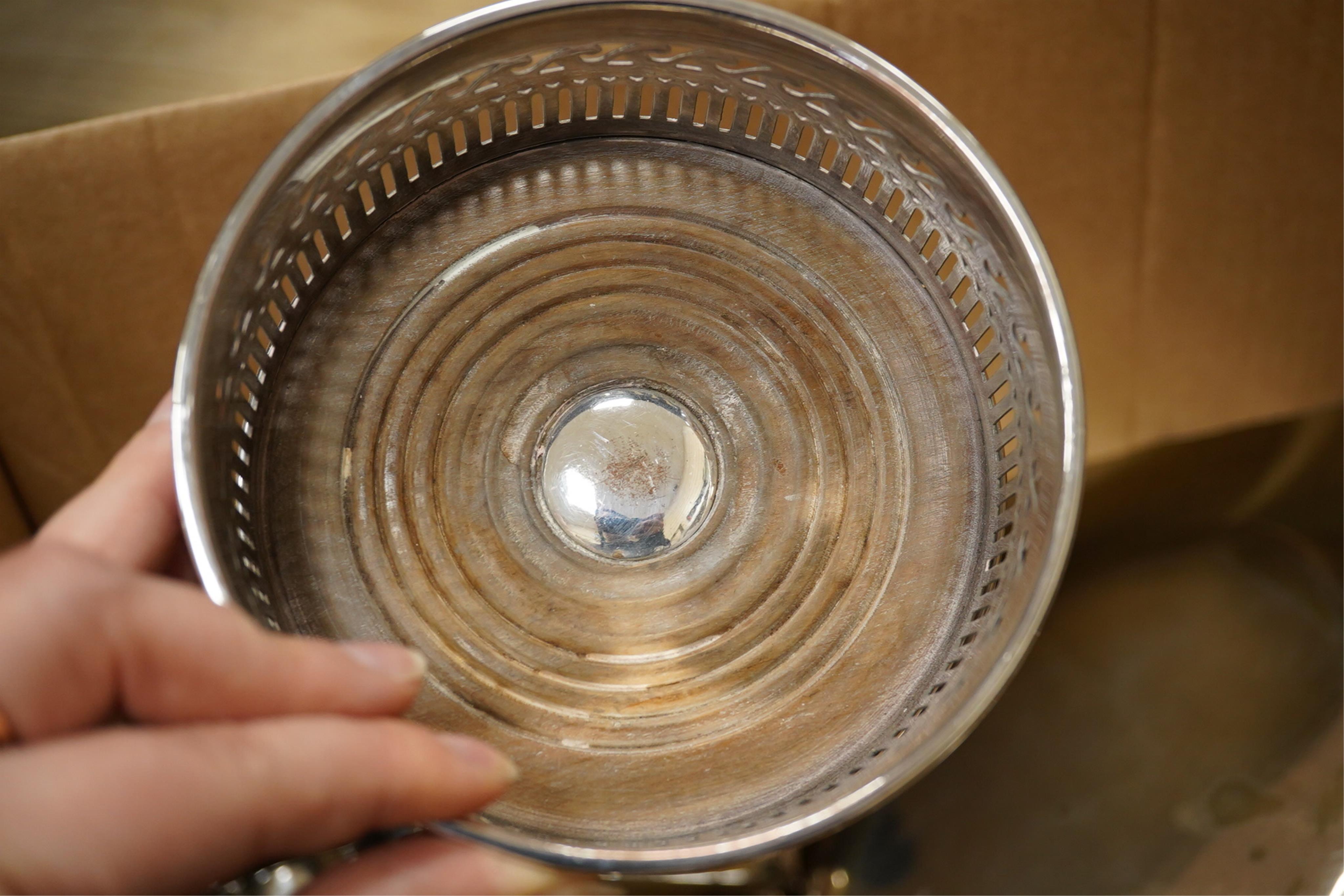 A quantity of assorted plated ware including entrée dishes, toast racks, salvers, pair of coasters and a coromandel wood tantalus (no key) etc.